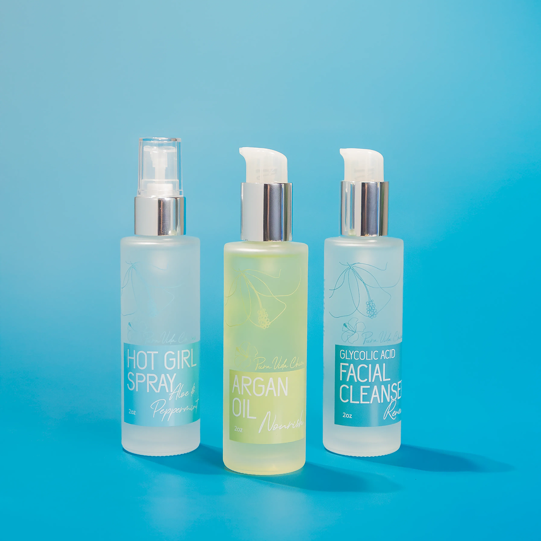 Hot Girl Spray Argan Oil and Facial Cleanser spray bottles